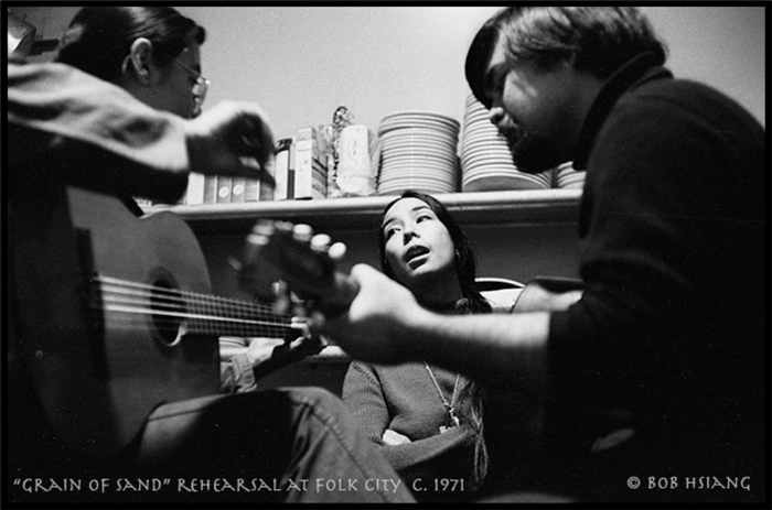 (L to R) Charlie, Nobuko, and Chris rehearsing in the kitchen of Folk City before a performance, New York City, ca. 1971. Photo by and courtesy of Bob Hsiang